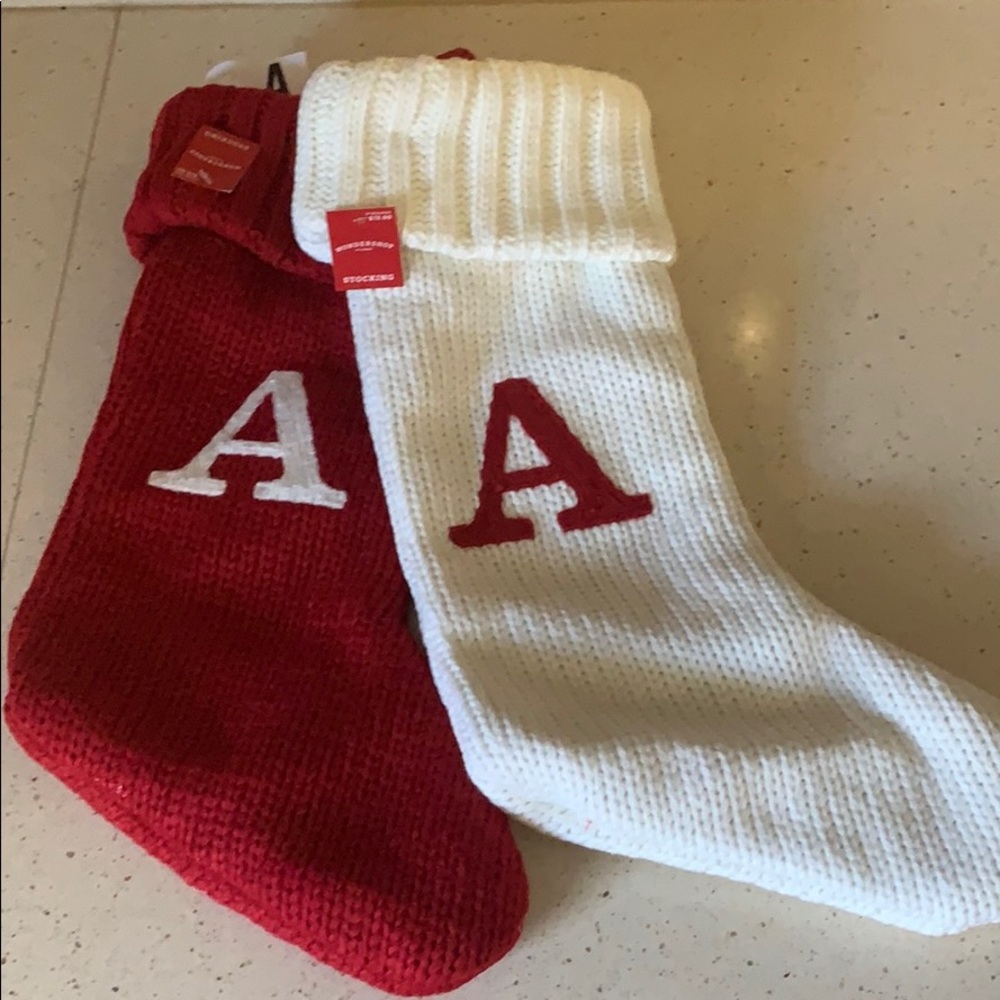 “A” monogram stockings pair